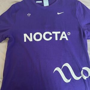 Nike Nocta shirt 
Extra large but fits like a large 
Never worn.